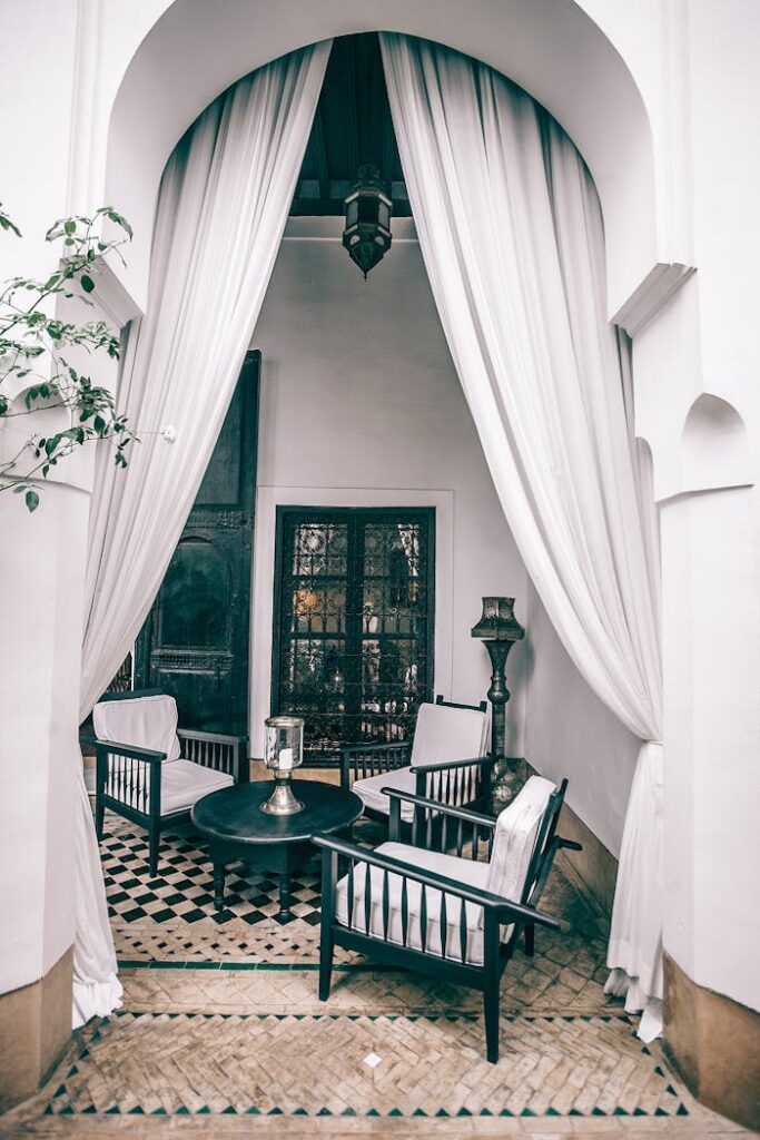 Terrace of villa with chairs around table