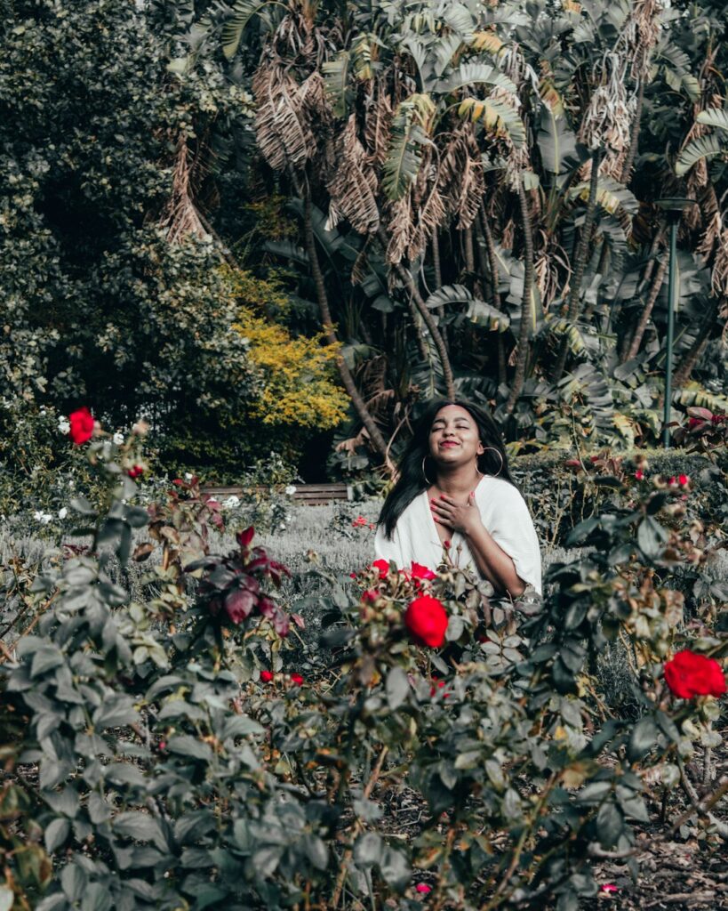 woman-in-white-shirt-holding-red-heart-balloon-p7mdaremch4